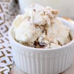 Chocolate chip cookie dough ice cream in small white bowl