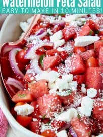 Diced watermelon in bowl with crumbled feta cheese
