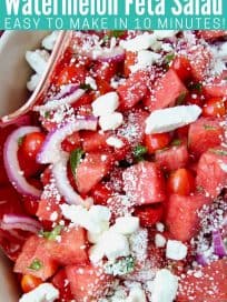 Diced watermelon in bowl with crumbled feta cheese