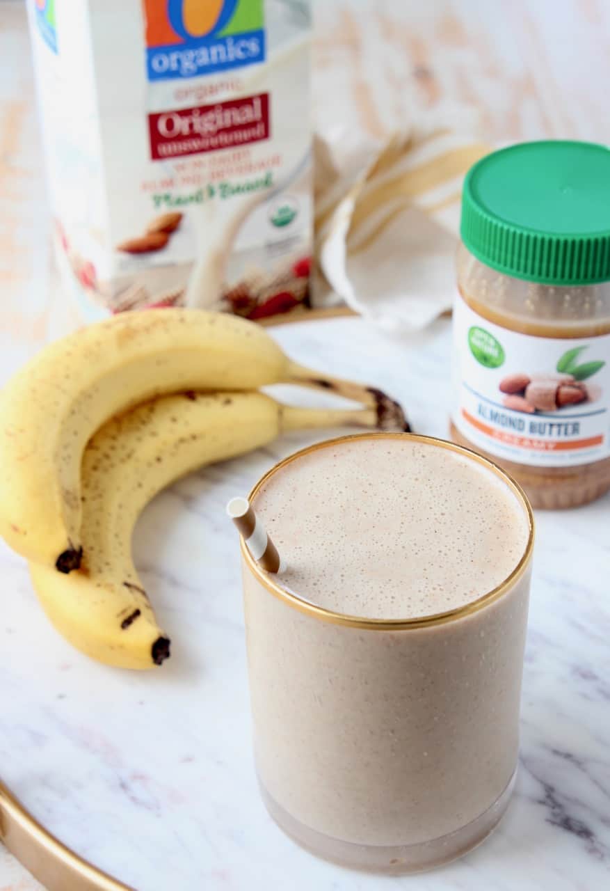 smoothie in glass with straw