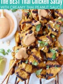 Chicken skewers drizzled with peanut sauce