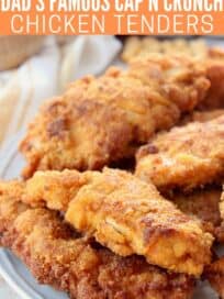 Stacks of fried chicken strips on plate