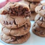 chocolate cookies stacked up on plate