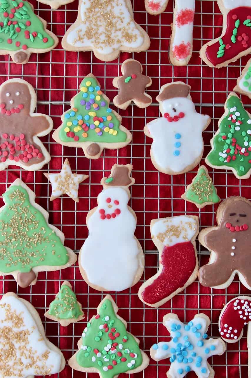 overhead image of decorated sugar cookies on metal baking rack
