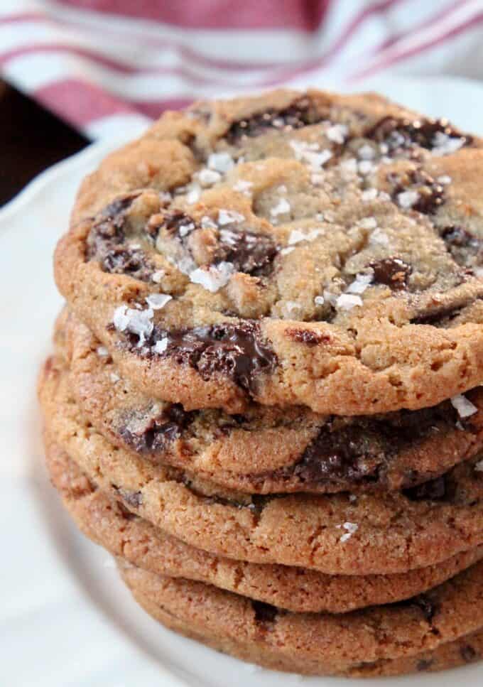 stacked up chocolate chip cookies on plate