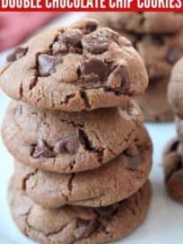 double chocolate chip cookies stacked up on plate