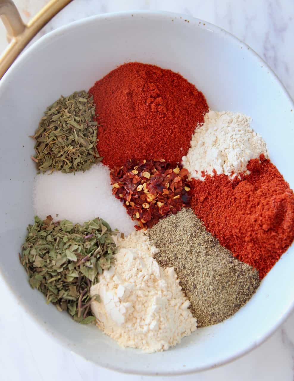 spices in white bowl