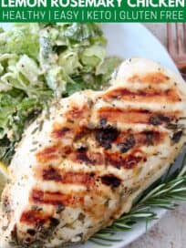overhead image of grilled chicken breast on plate with salad
