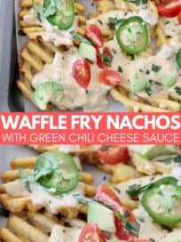 waffle fry nachos on baking sheet topped with cheese sauce and jalapenos