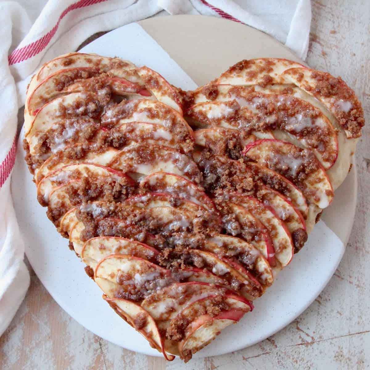 overhead image of heart shaped apple pizza