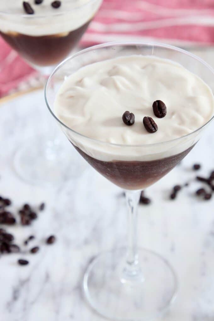 two espresso martinis on marble serving tray