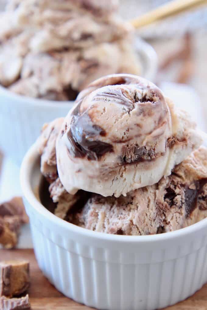 scoops of moose tracks ice cream in small white bowl