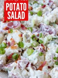 potato salad in bowl with bacon and green onions