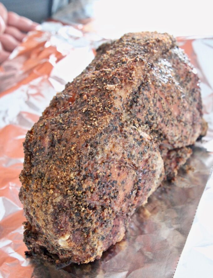 seasoned pork shoulder on a piece of foil