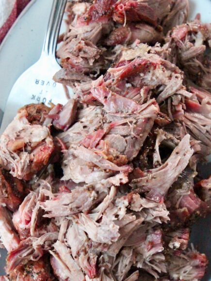 pulled pork on plate with serving fork