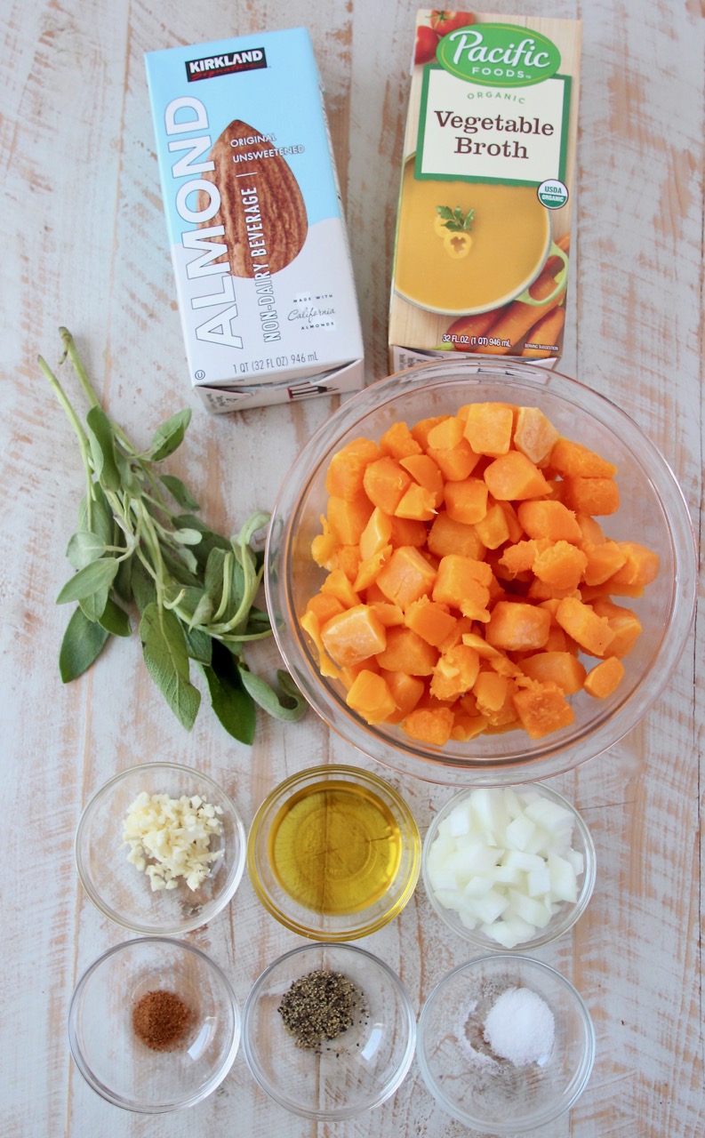 butternut squash pasta sauce ingredients on a white wood board