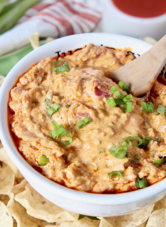 cheeseburger queso dip in bowl with spoon