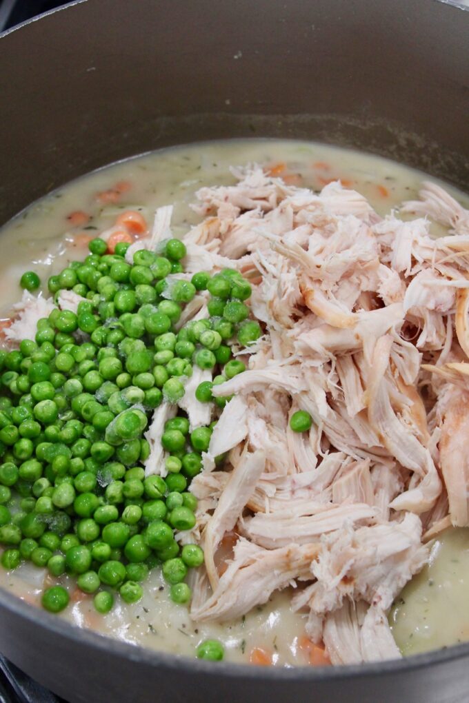 peas and shredded chicken in a pot