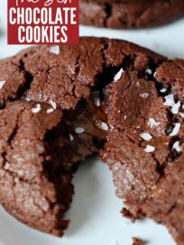 chocolate cookie topped with sea salt on plate