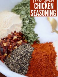 spices for chicken seasoning in bowl with gold spoon