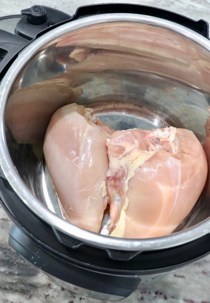 raw chicken breasts in an instant pot