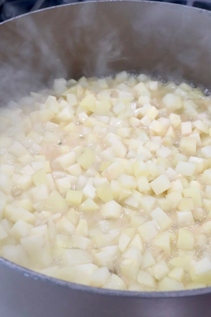 diced potatoes in liquid in a large pot