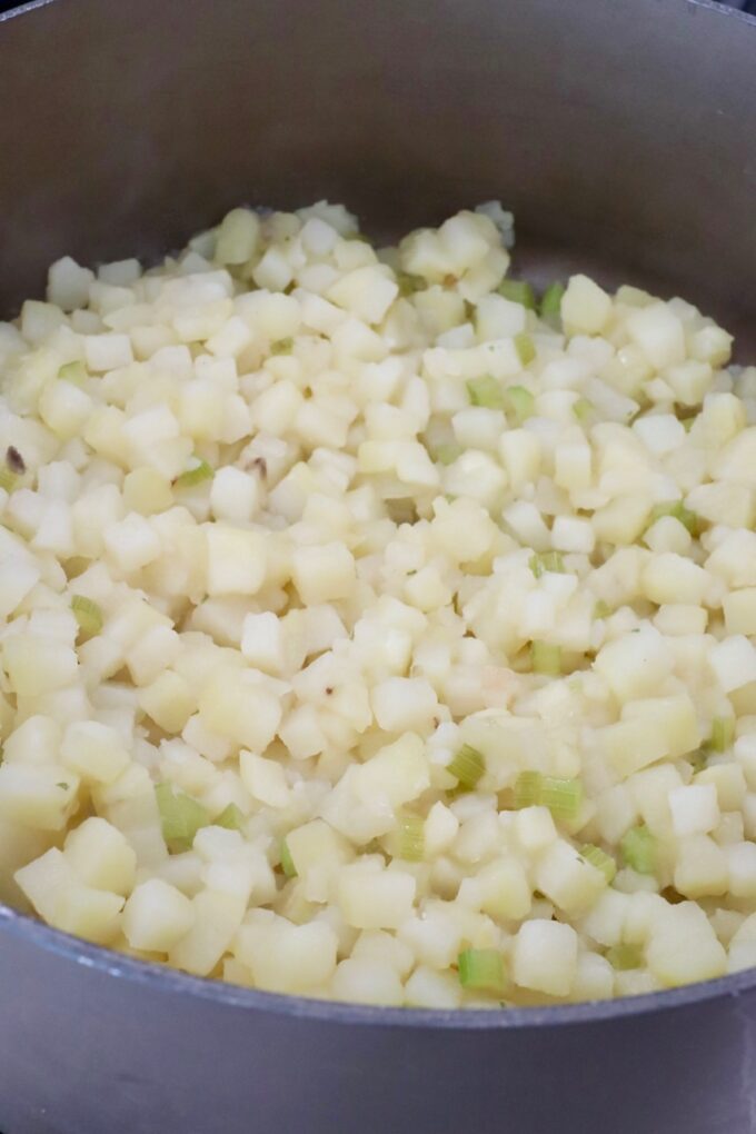 cooked diced potatoes in a large pot