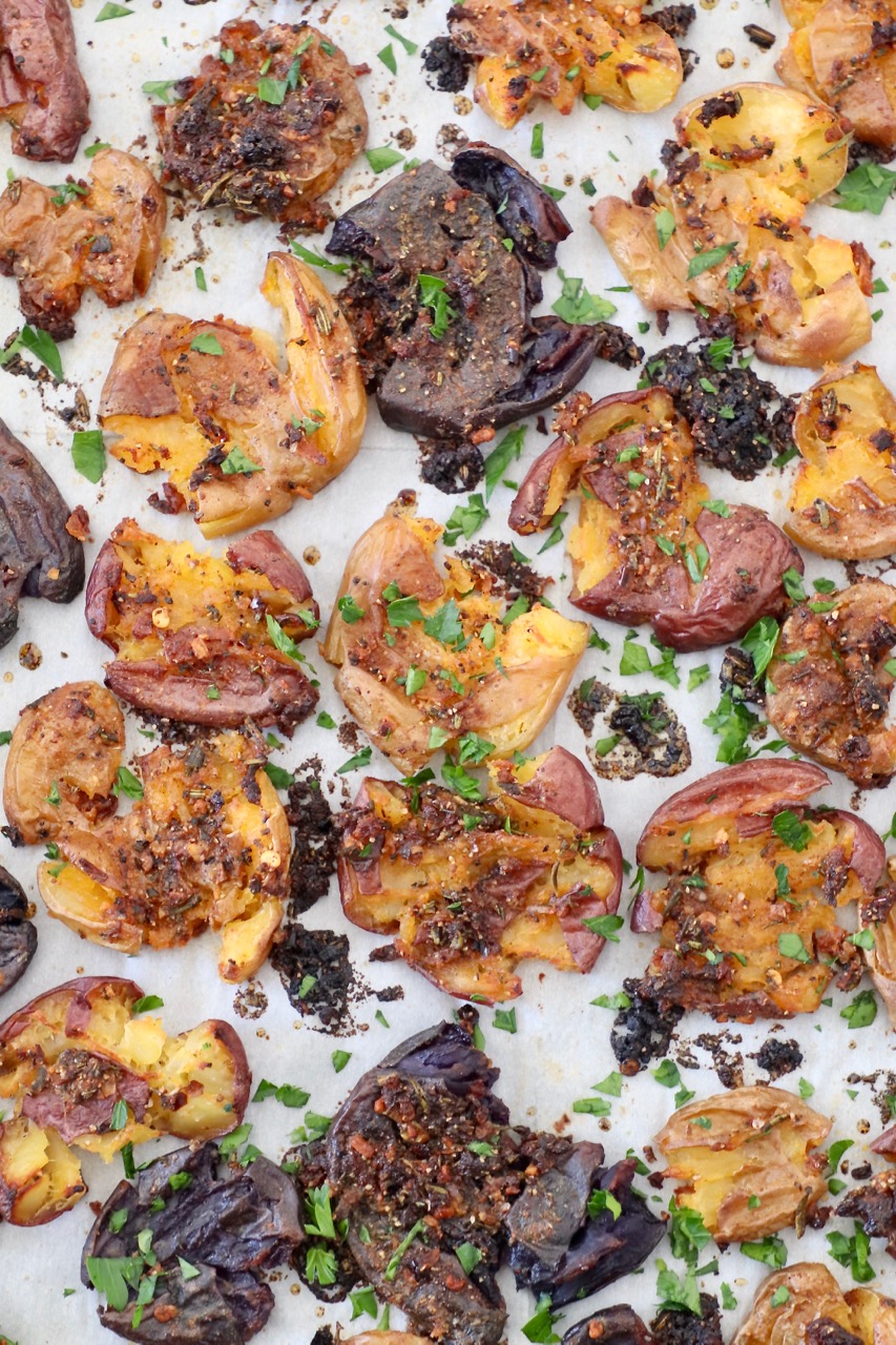 smashed potatoes on a baking sheet