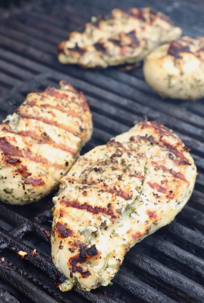 grilled chicken breasts on a grill