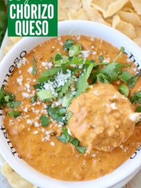 chorizo queso dip in bowl with serving spoon