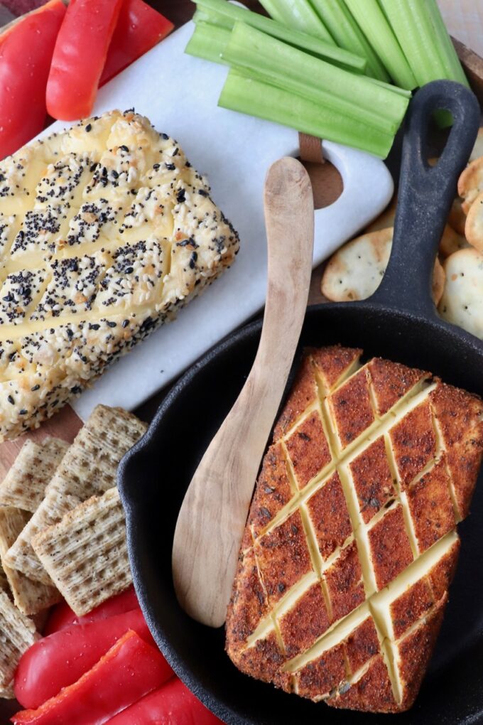 smoked cream cheese on platter with crackers and vegetables