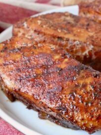 glazed smoked pork chops on plate