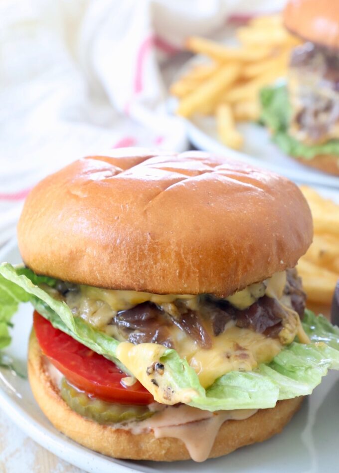 animal style burger on plate