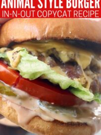 double meat and double cheese burger with lettuce tomatoes and pickles