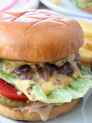 animal style burger on plate