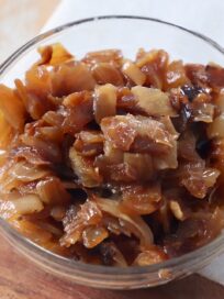 diced caramelized onions in small glass bowl