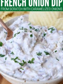 french onion dip in bowl with spoon