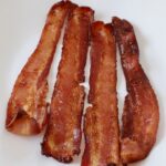 crispy cooked bacon on plate