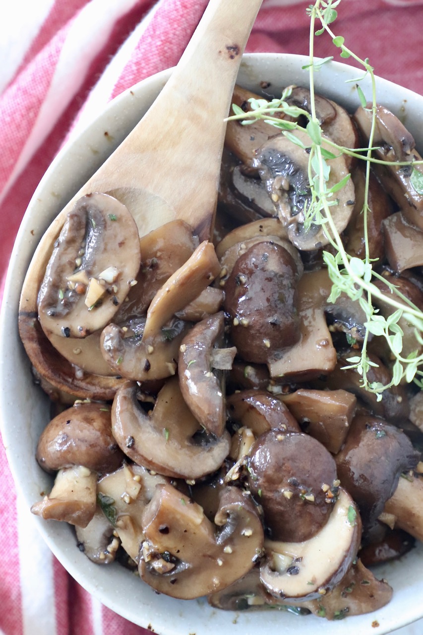 sauteed mushrooms in bowl with spoon