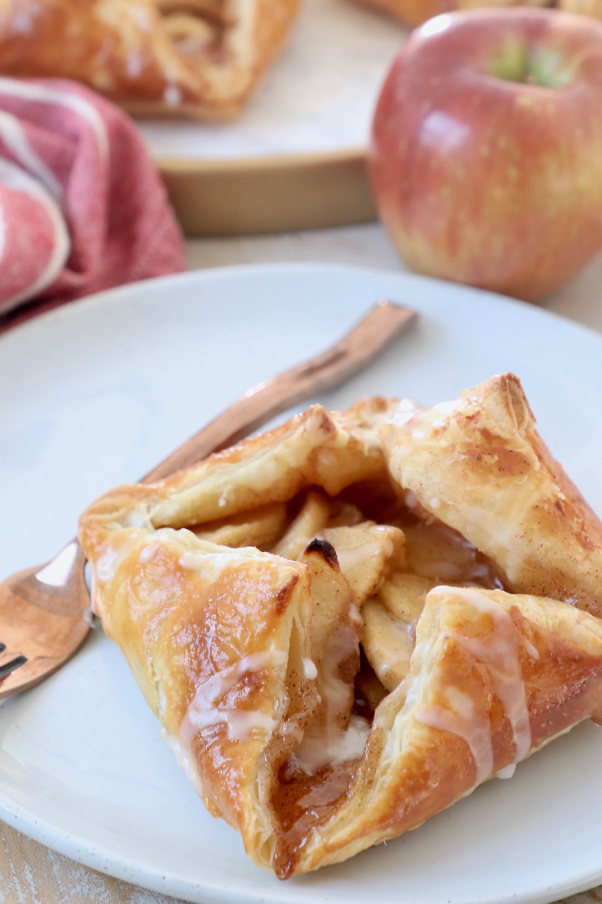 apple danish on plate with fork