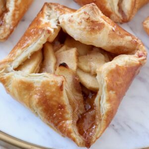 cooked apple danish on marble serving tray