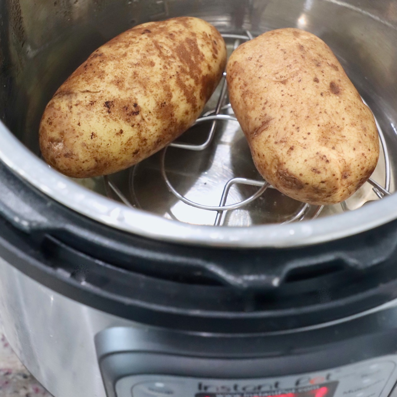 https://whitneybond.com/wp-content/uploads/2022/11/instant-pot-baked-potatoes-7.jpg