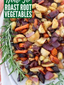 roasted root vegetables on plate with fresh rosemary