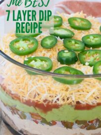 seven layer dip in glass trifle bowl