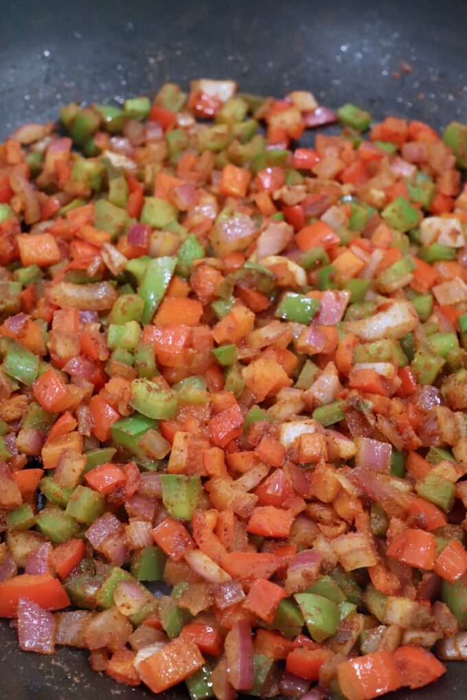 fajita seasoned diced peppers and onions in skillet
