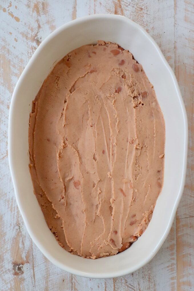 refried beans in casserole dish