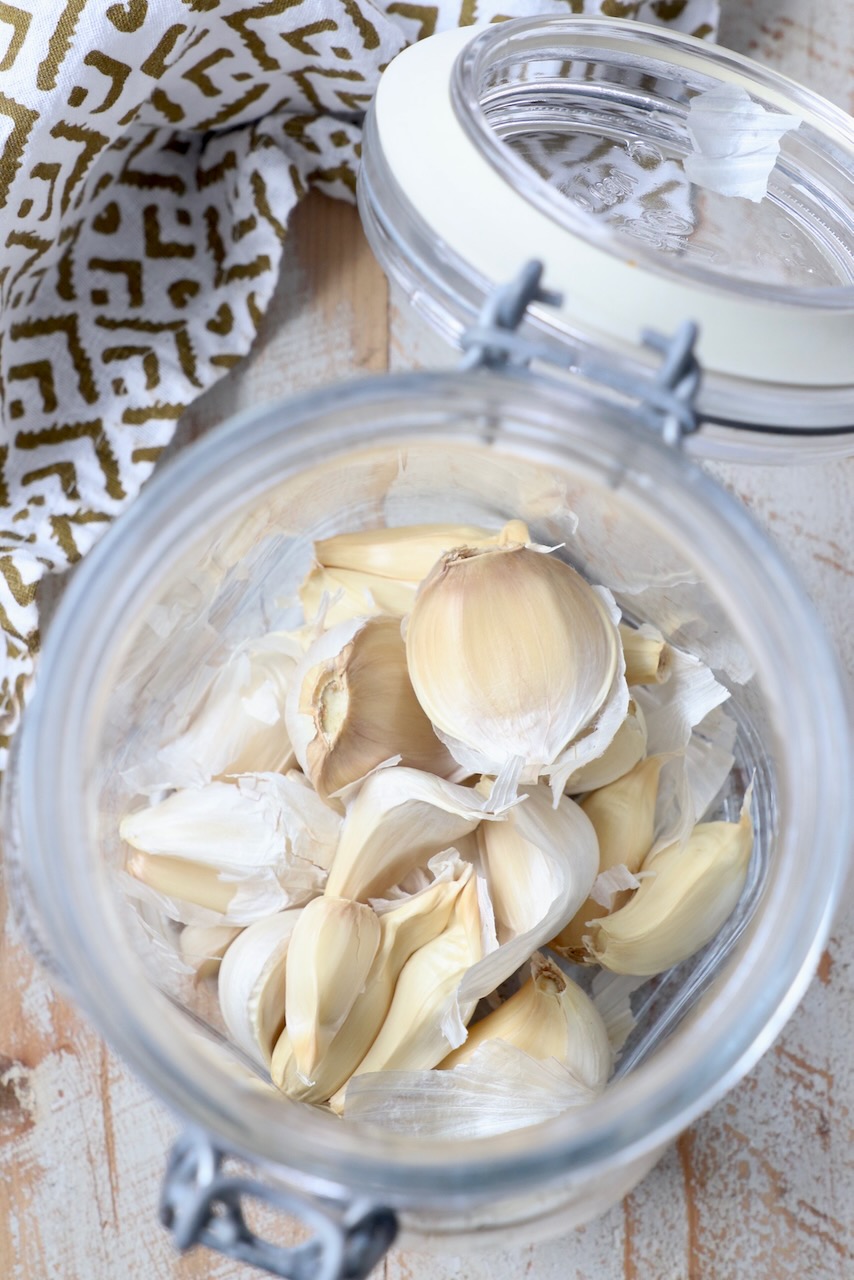garlic cloves in glass jar