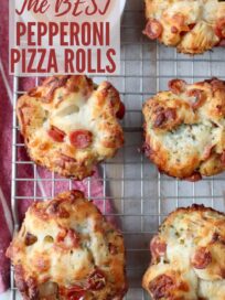 cheesy pepperoni pull apart rolls on wire cooling rack