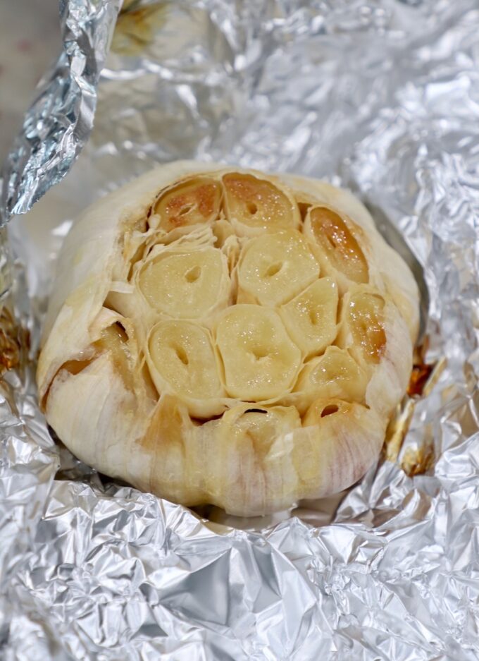 roasted head of garlic wrapped in a piece of foil