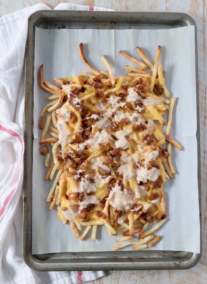 animal style fries on baking sheet